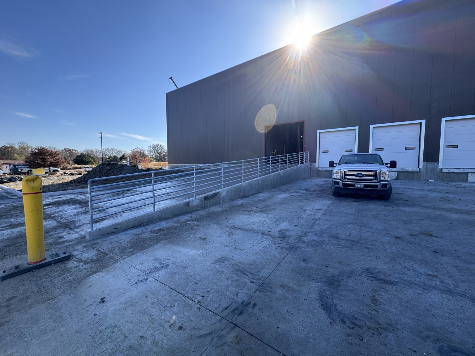 HD Fabrication metal railings along a commercial concrete ramp